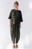 Front view of model wearing Izzy Top in Mud Stripe and Cadence Pant in Mud in front of white background