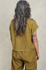 Back view of model wearing Jones Top and Larkin Pant both in Fennel in front of white background
