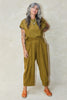 Model wearing Jones Top in Fennel and Larkin Pant in Fennel against white background