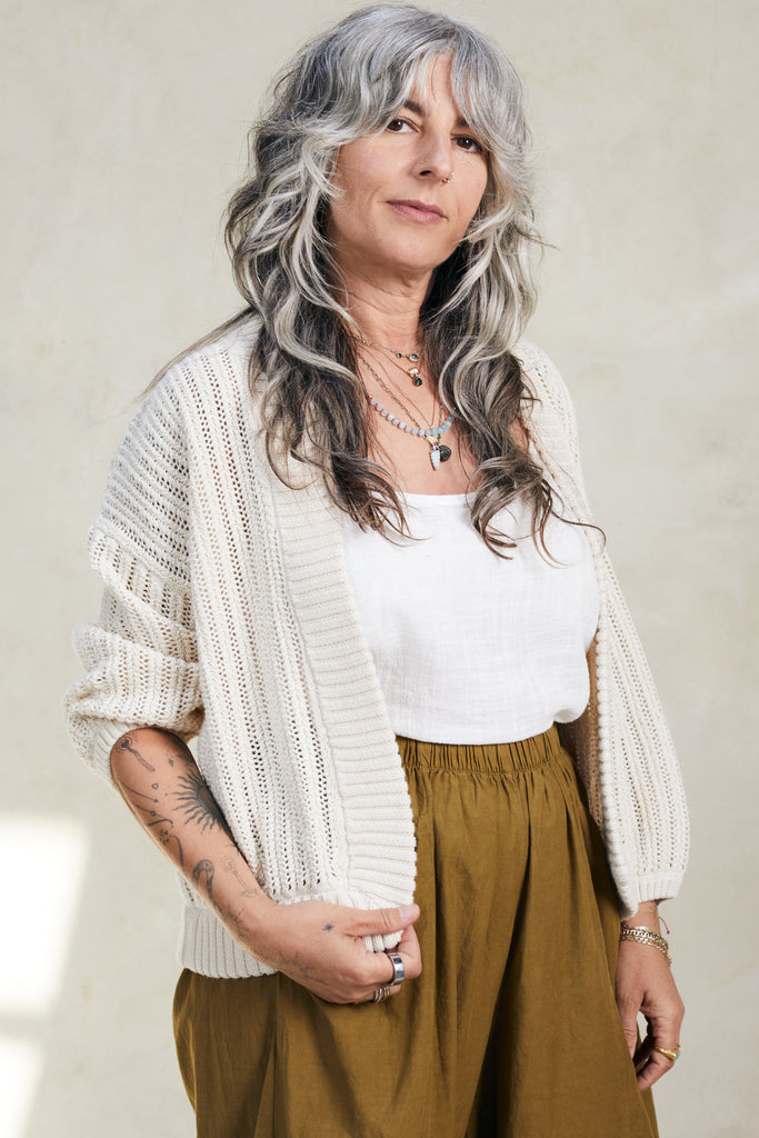 Maeva Cardigan in Biscuit on model in front of white background