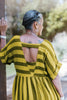 Back view of Perry Stripe Dress in Dijon on model