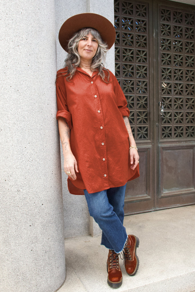Long Poet Blouse in Brick on model in front of stone building