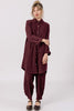 Front view of model wearing Workshirt in Burgundy and Cadence Pant in Burgundy, standing in front of white background