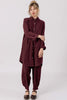 Front view of model wearing Workshirt in Burgundy and Cadence Pant in Burgundy, standing in front of white background