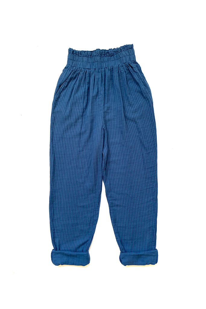 bright blue pants with cuffed ankle and elastic waist on white background
