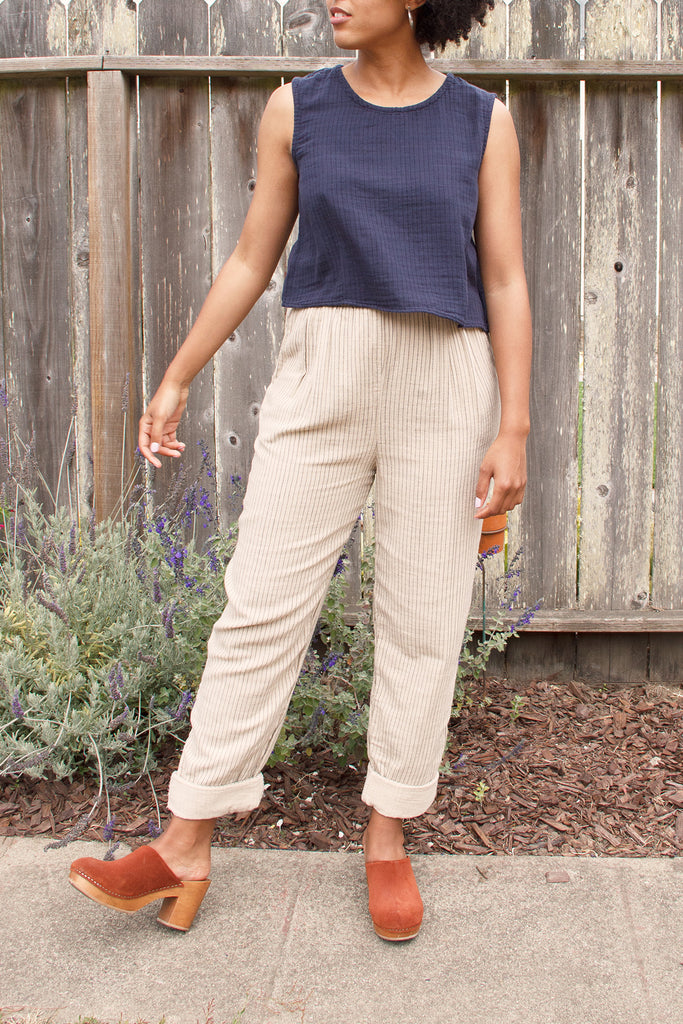 elastic waiste cuff pants in neutral beige on model