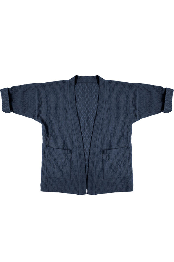 quilted jacket with front patch pockets in navy blue on white background
