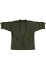 forest green quilted jacket with front patch pockets against white background