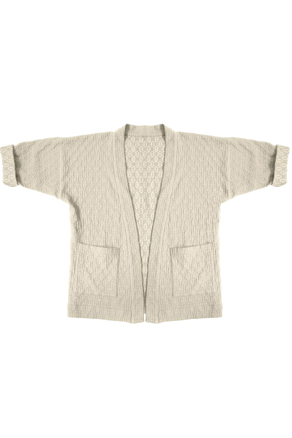 beige quilted jacket with front patch pockets on white background